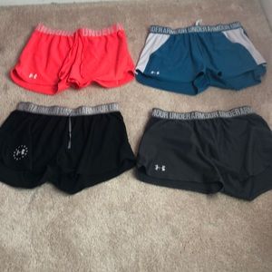 Under armor shorts four pair women’s large